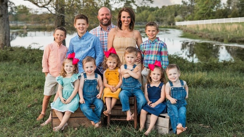 Courtney and Eric Waldrop along with all their kids smiling 