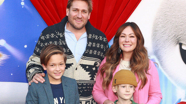 Curtis Stone, Lindsay Price and their children at an event