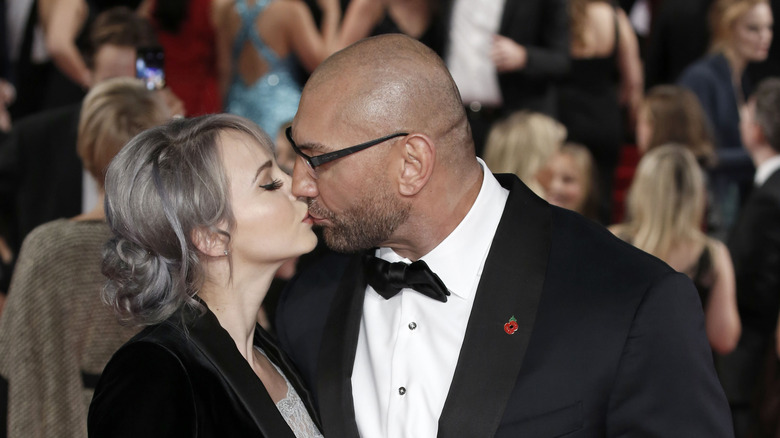 Dave Bautista and Sarah Jade kissing