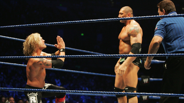 Batista in the ring with Edge