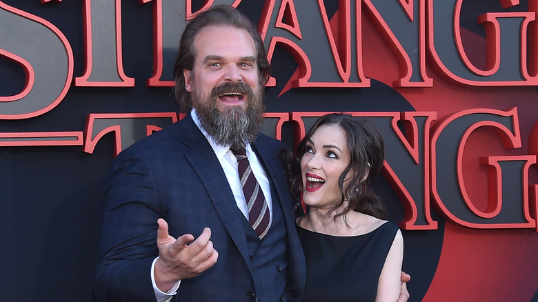 David Harbor and Winona Ryder posing