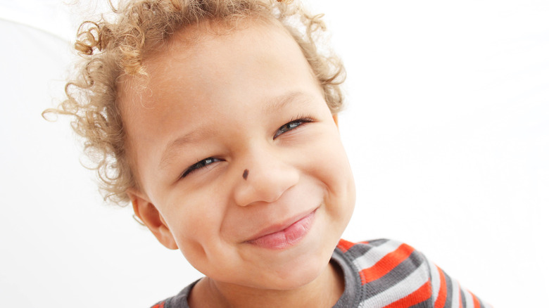 Young boy with dimples