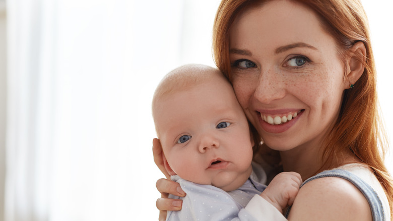 woman with dimples with baby without dimples