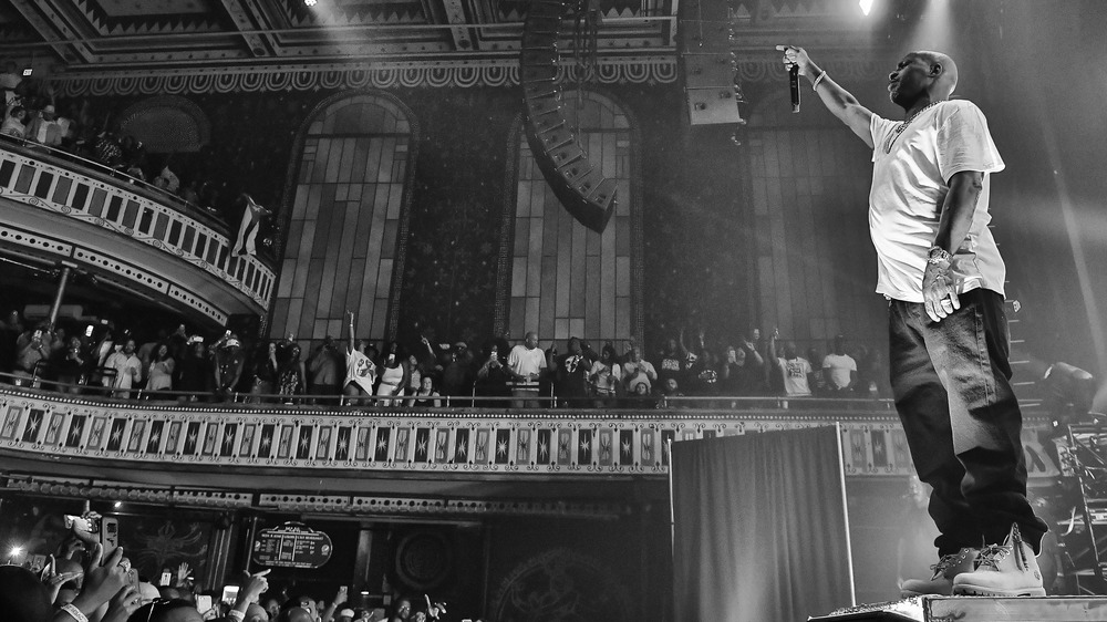 DMX saluted fans from the stage at a concert