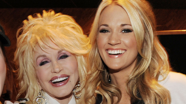 Dolly Parton and Carrie Underwood backstage at Parton's "Live From London" DVD premiere party