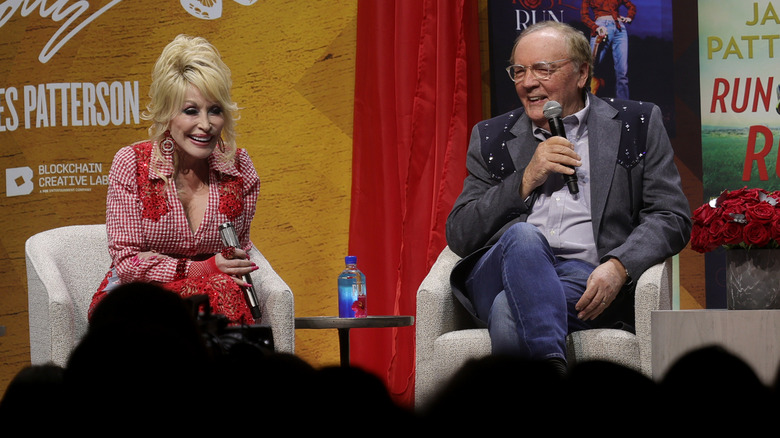 James Patterson and Dolly Parton speaking on a panel