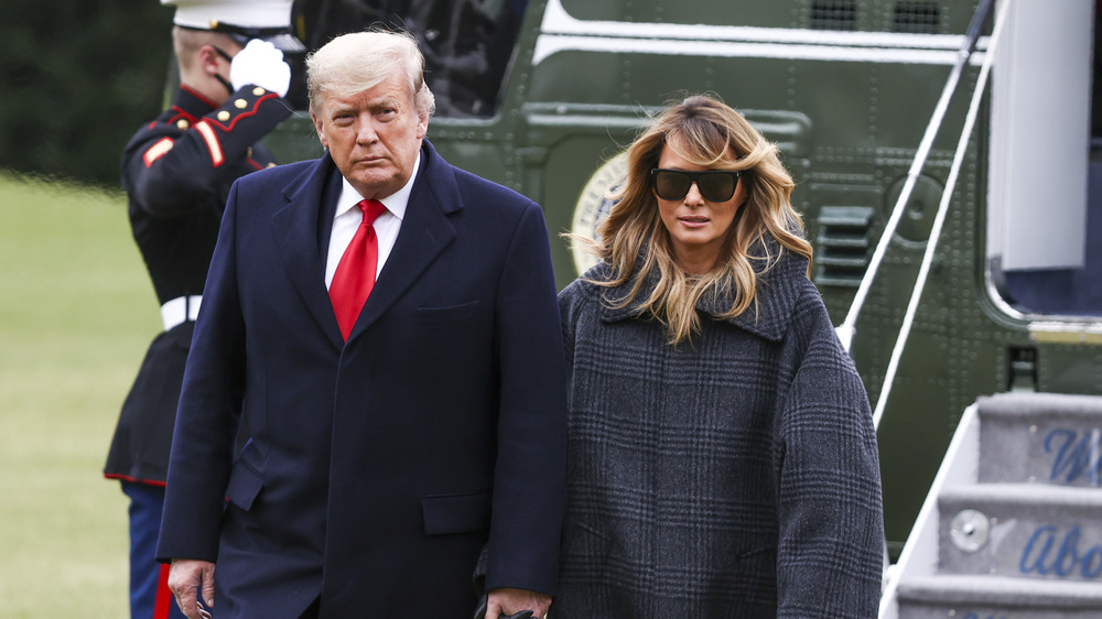 Donald and Melania Trump exiting a helicopter
