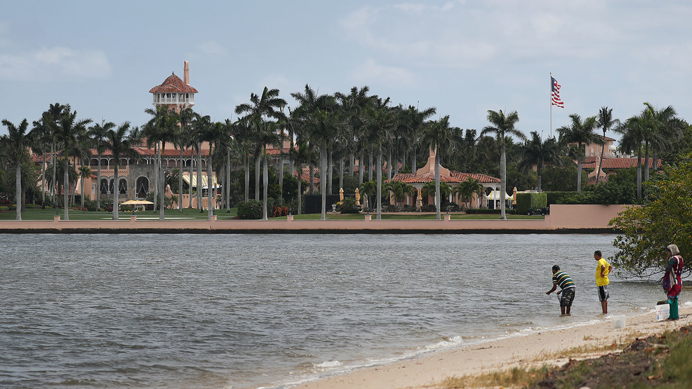 The exterior of Mar-a-Lago from a nearby beach