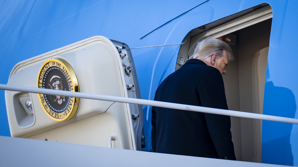 Donald Trump boarding a plane