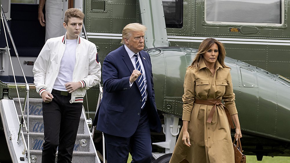 Tall Barron Trump with Donald Trump and Melania Trump