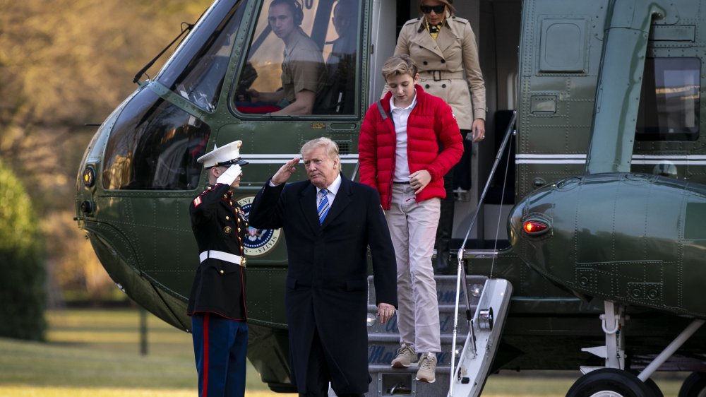 Barron Trump, Donald Trump, and Melania Trump arriving at the White House