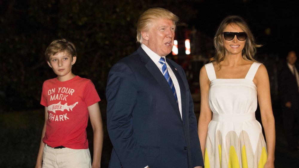 Barron Trump, Donald Trump, and Melania Trump