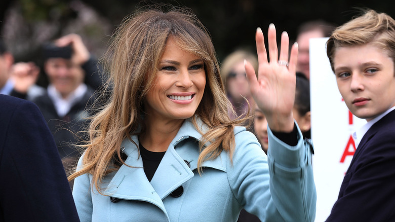 Melania waving near Barron Trump