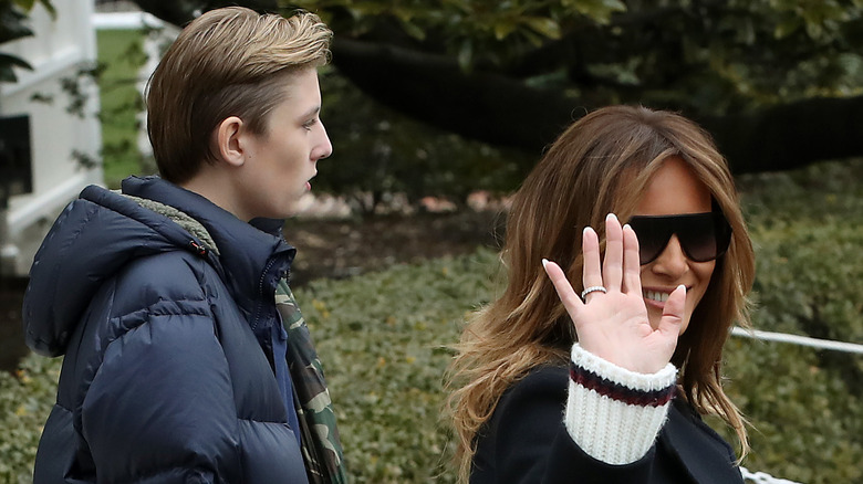 Melania and Barron Trump walking together