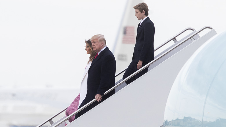 Barron Trump exiting Air Force One with his parents