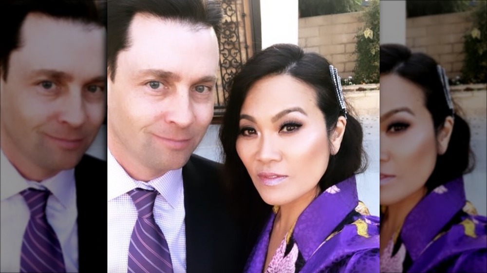 Dr. Sandra Lee and Dr. Jeffrey Rebish wearing purple