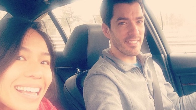 Drew Scott and Linda Phan in a car