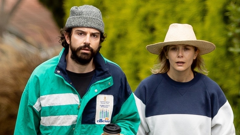 Robbie Arnett and Elizabeth Olsen getting takeout