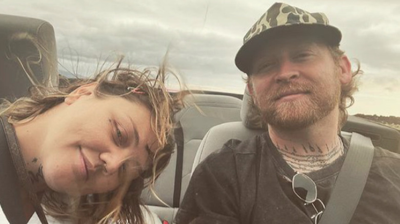 Elle King enjoys a ride in a convertible with boyfriend Dan Tooker.