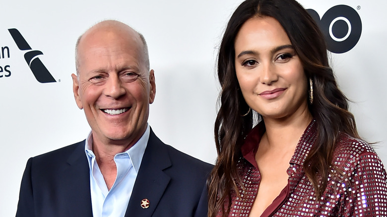 Bruce Willis and Emma Heming smiling