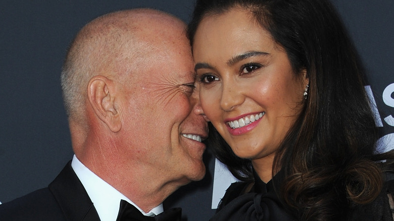 Bruce Willis with Emma Heming Willis at event