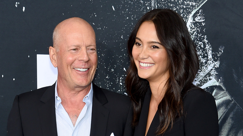 Bruce Willis and Emma Heming smiling