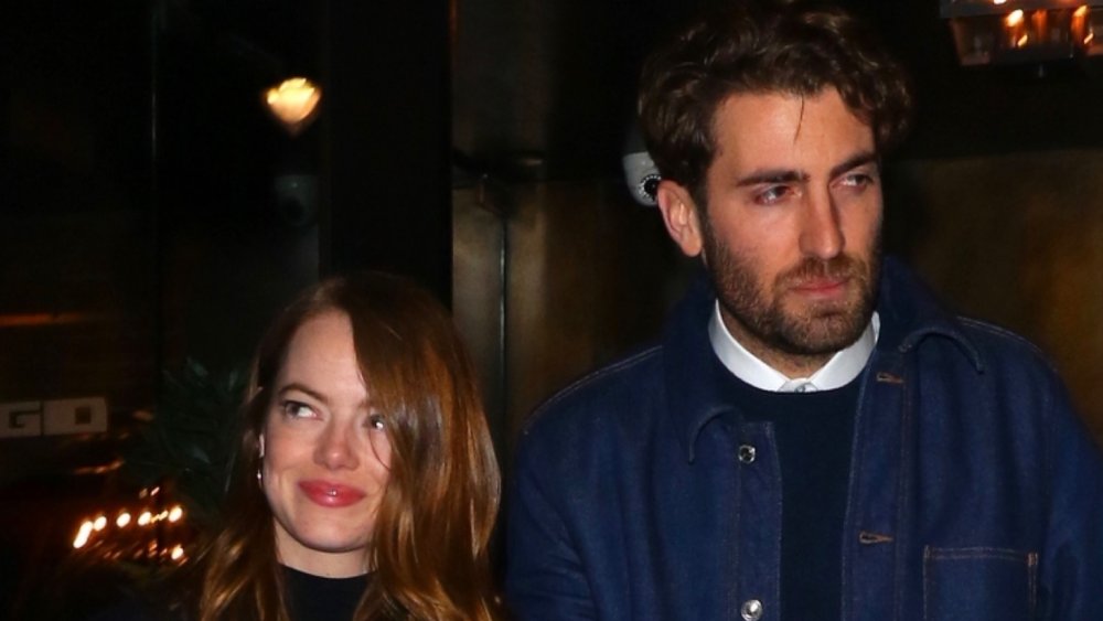Dave McCary and Emma Stone leaving a restaurant