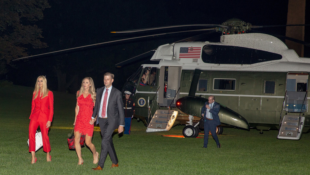 Eric Trump and family members exiting a helicopter