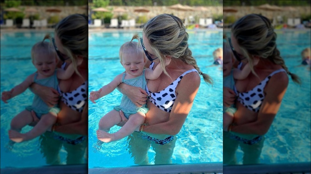 Lara Trump in a pool with her toddler