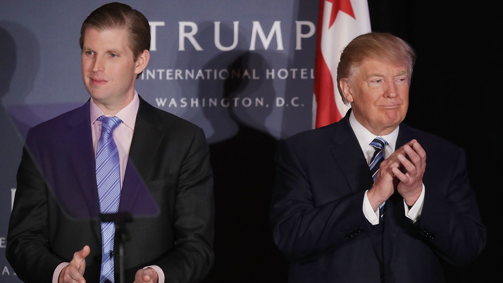 Eric Trump and Donald Trump standing together