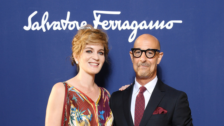 Stanley Tucci and Felicity Blunt pose on the red carpet together