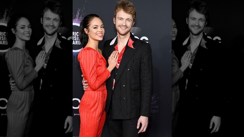 Finneas and Claudia Sulewski at a red carpet event