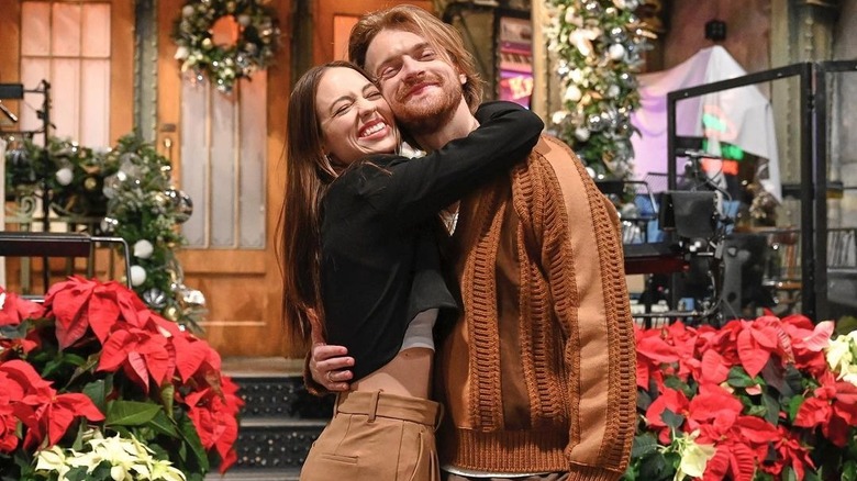 Finneas and Claudia Sulewski hugging