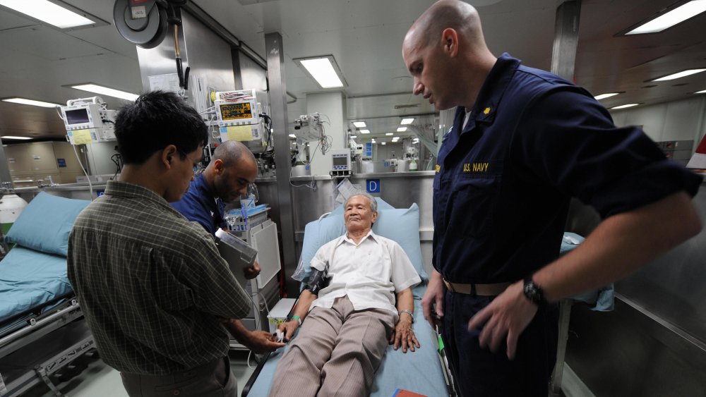 Patient being treated onboard the USNS Mercy