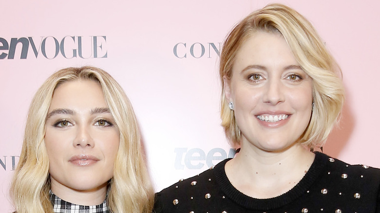 Florence Pugh and Greta Gerwig pose for a picture at an event