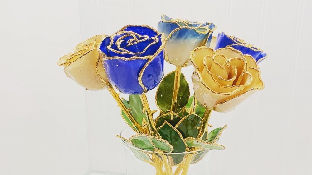 Gold tipped forever roses