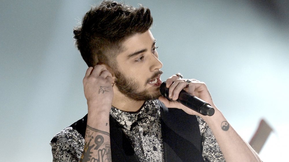 Zayn Malik performing on stage