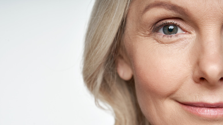 Woman with gray eyes looking into the camera