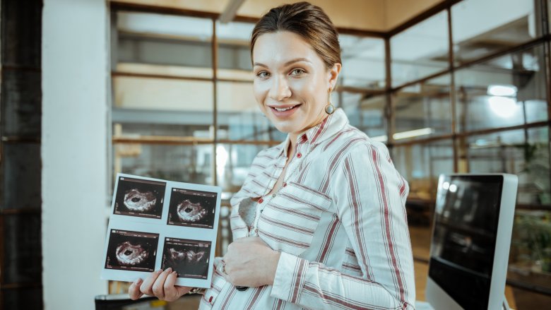 pregnant woman with green eyes