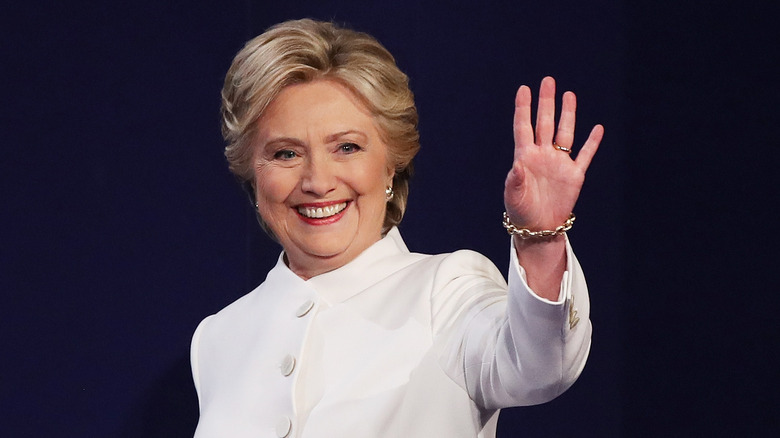 Hillary Clinton waves at the crowd