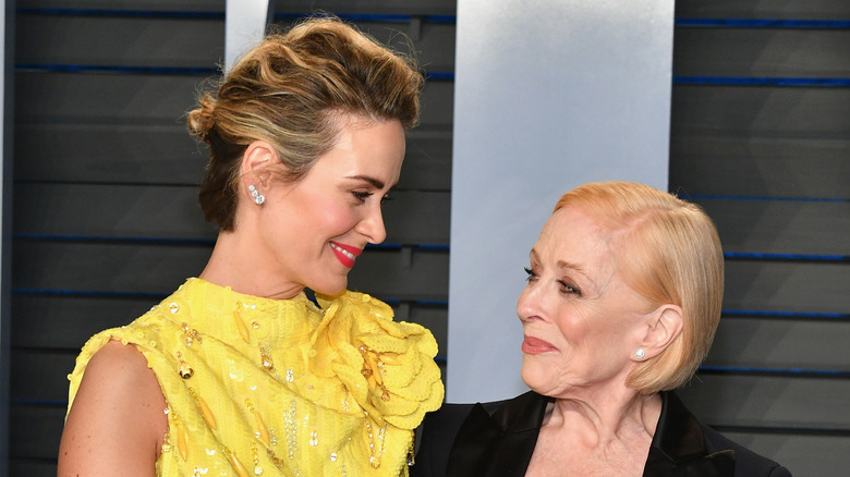 Sarah Paulson and Holland Taylor smiling at eachother