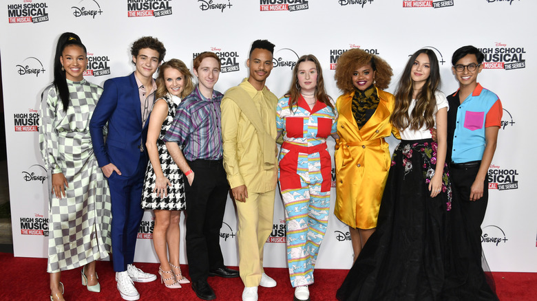 Larry Saperstein and the cast of HSMTMTS on red carpet
