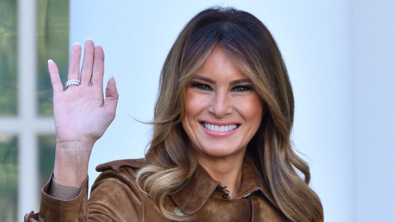 Melania Trump waves and smiles