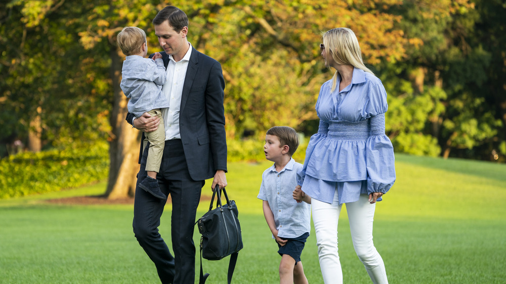 Ivanka Trump Jared Kushner walking with their kids