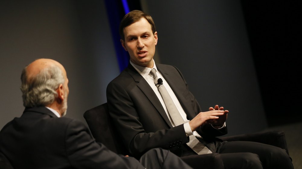 Jared Kushner sitting and speaking during an interview