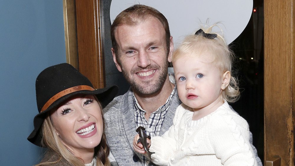 Jamie Otis, Doug Hehner, and their daughter Henley Grace