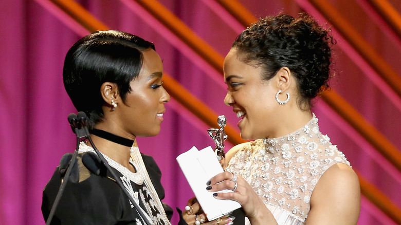 Janelle Monáe and Tessa Thompson on stage 