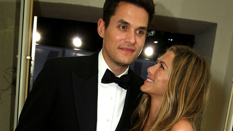 Jennifer Aniston and John Mayer at an awards show.