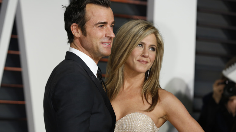 Justin Theroux and Jennifer Aniston attend the Oscars.