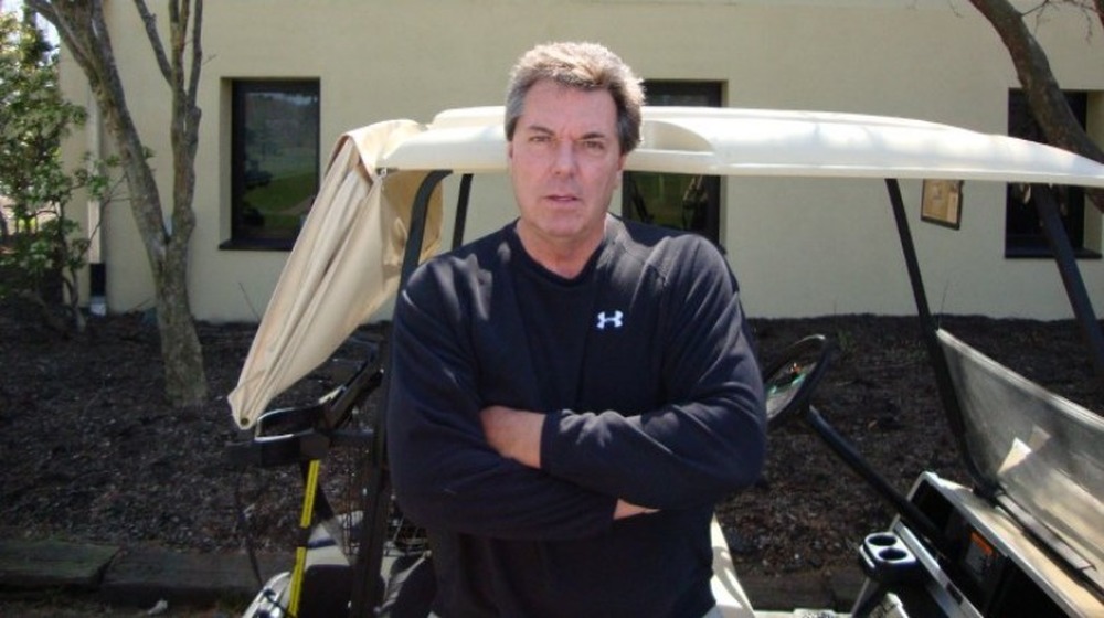 Bill Stevenson with golf cart